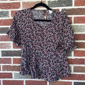 Floral top with ruffle like sleeves and bottom (cropped) yet flowy. (Small)